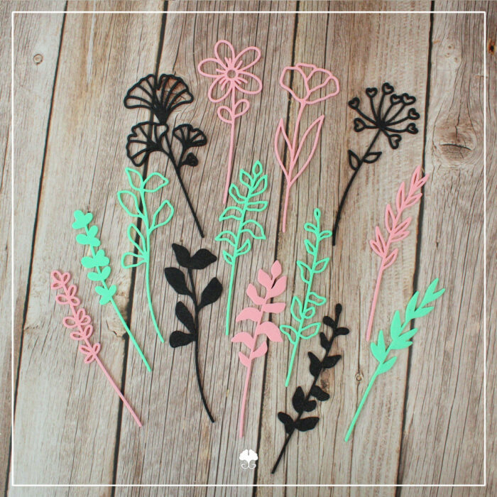 Abgebildet sind alle Elemente der 3D Große Wildblumen - 3D Druckdatei. Sie wurden mit dem 3D Drucker in rosa, schwarz und türkis gedruckt.